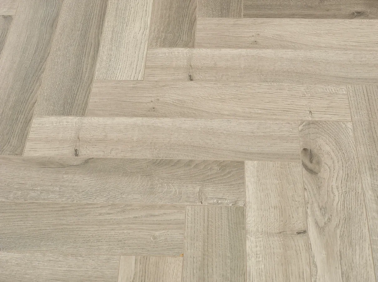 Light Grey Oak Aalborg 12mm Light Grey Laminate Herringbone - Image 3